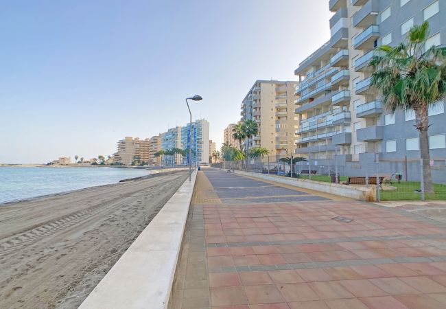 Apartamento en La Manga del Mar Menor - Precioso tipo dúplex en primera línea del Mediterráneo