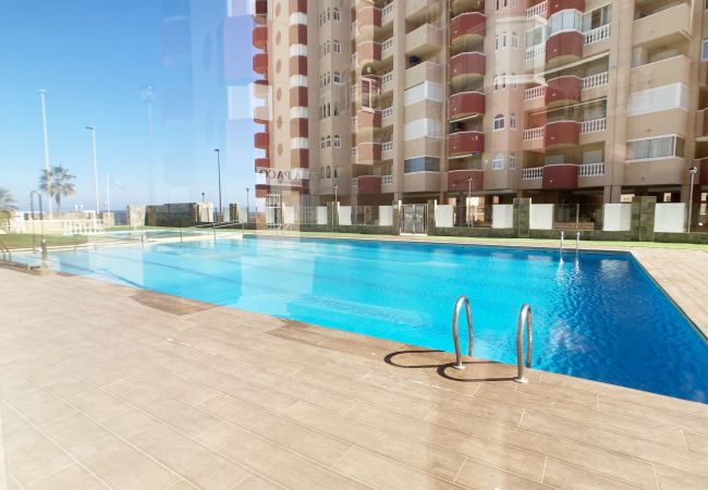 Apartment in La Manga del Mar Menor - 3-bedroom with pool and paddle court frontline to the Mediterranean Sea