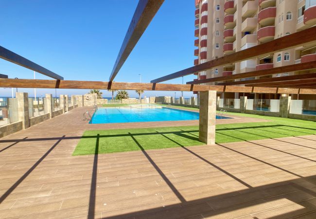 Apartment in La Manga del Mar Menor - 3-bedroom with pool and paddle court frontline to the Mediterranean Sea