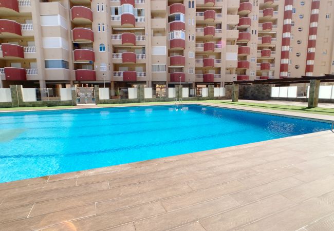 Apartment in La Manga del Mar Menor - 3-bedroom with pool and paddle court frontline to the Mediterranean Sea